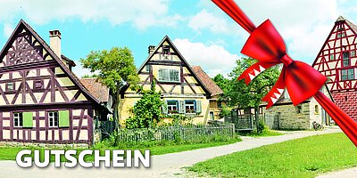 Gutschein zum Schnupppern Bild des Gutscheins mit roter Schleife für eine Schnuppermitgliedschaft